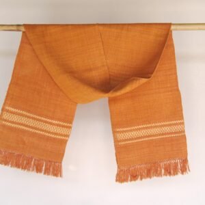 Eri silk stole in orange with a golden design